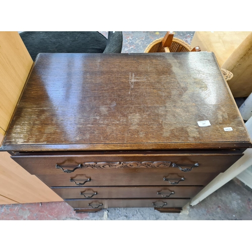 127 - An Art Deco style oak chest of four drawers - approx. 99cm high x 78cm wide x 47cm deep