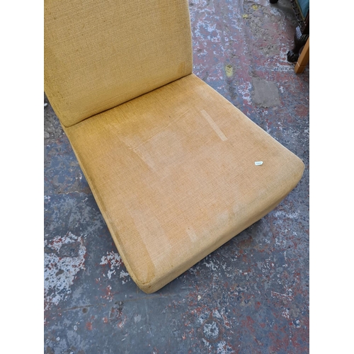 129 - A modern beige fabric upholstered lounge chair - approx. 88cm high x 63cm wide x 68cm deep