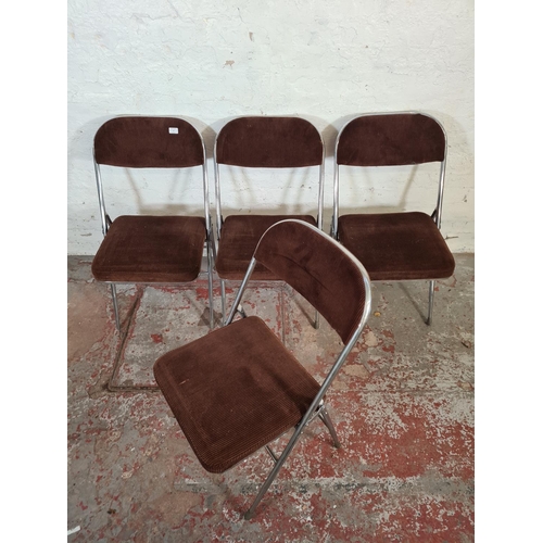 13 - A set of four 1970s brown upholstered and chrome plated folding chairs