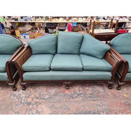 139 - A Georgian style mahogany and rattan bergere three piece lounge suite comprising three seater sofa a... 