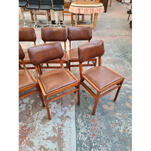 143 - Ten 1960s Ben Chairs beech and brown vinyl chairs, designed by Ben Stoe