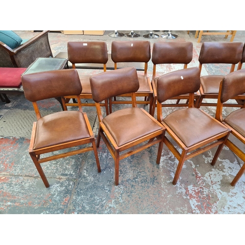 143 - Ten 1960s Ben Chairs beech and brown vinyl chairs, designed by Ben Stoe