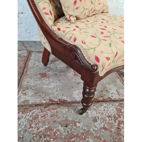 15 - A Victorian mahogany and fabric upholstered nursing chair