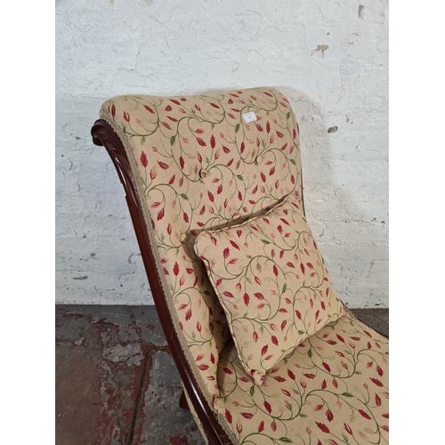 15 - A Victorian mahogany and fabric upholstered nursing chair