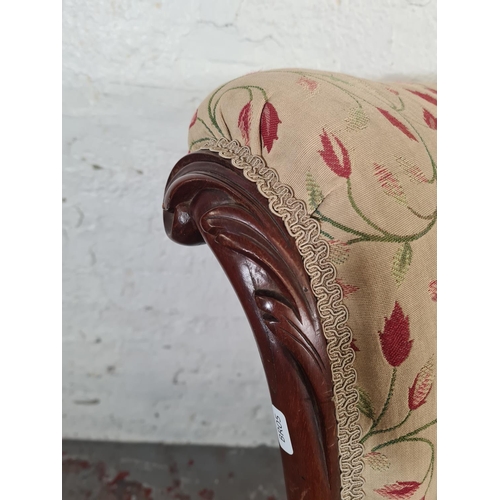 15 - A Victorian mahogany and fabric upholstered nursing chair