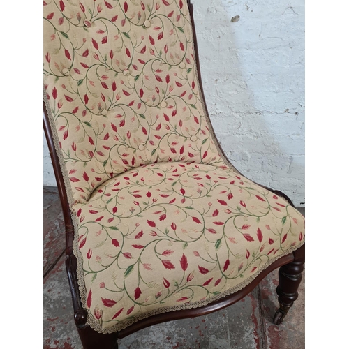 15 - A Victorian mahogany and fabric upholstered nursing chair