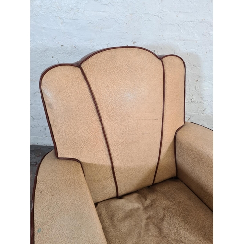 16 - An Art Deco brown and beige vinyl upholstered fan back armchair