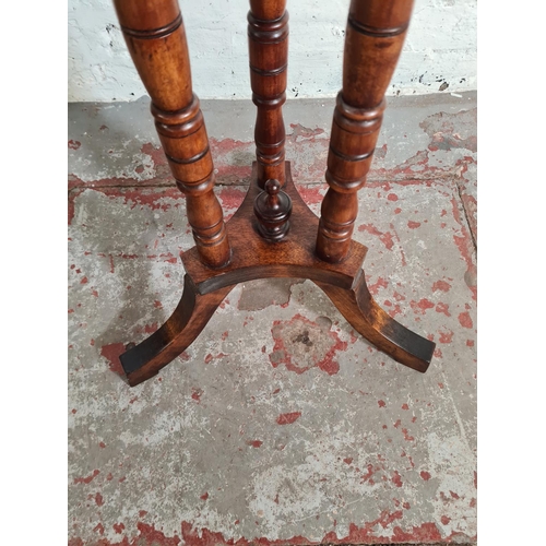 2 - An Edwardian mahogany octagonal tilt top table - approx. 74cm high x 57cm wide x 56cm deep