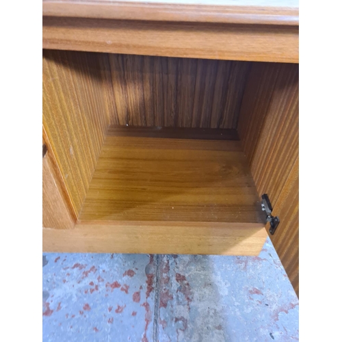 20 - A mid 20th century teak media unit