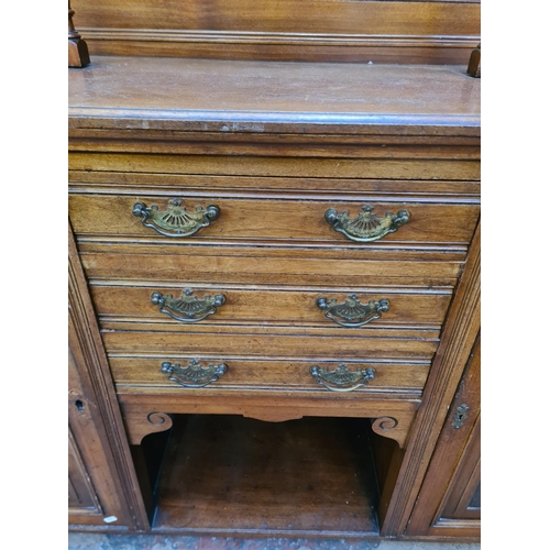 21 - An Edwardian carved mahogany mirror back sideboard - approx. 172cm high x 137cm wide x 45cm deep