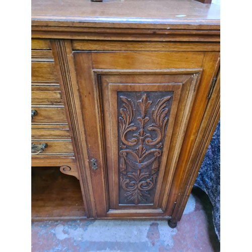 21 - An Edwardian carved mahogany mirror back sideboard - approx. 172cm high x 137cm wide x 45cm deep