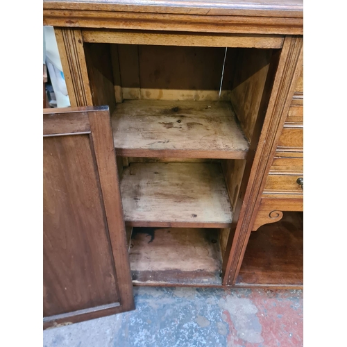 21 - An Edwardian carved mahogany mirror back sideboard - approx. 172cm high x 137cm wide x 45cm deep