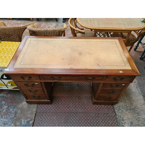 25 - An Edwardian mahogany pedestal desk with nine drawers and beige leather insert - approx. 73cm high x... 