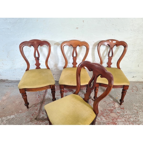 26 - A set of four Victorian mahogany and yellow fabric upholstered dining chairs