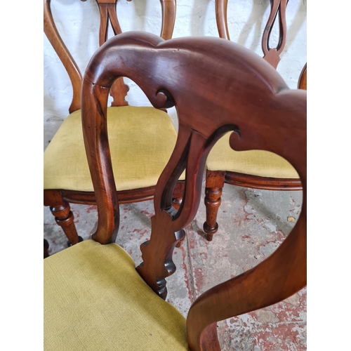 26 - A set of four Victorian mahogany and yellow fabric upholstered dining chairs