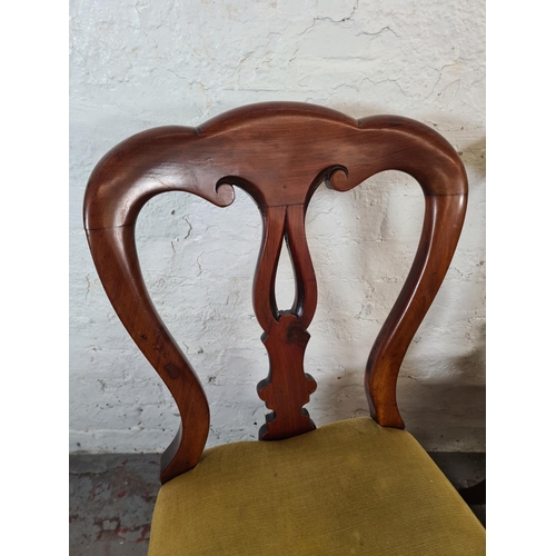 26 - A set of four Victorian mahogany and yellow fabric upholstered dining chairs