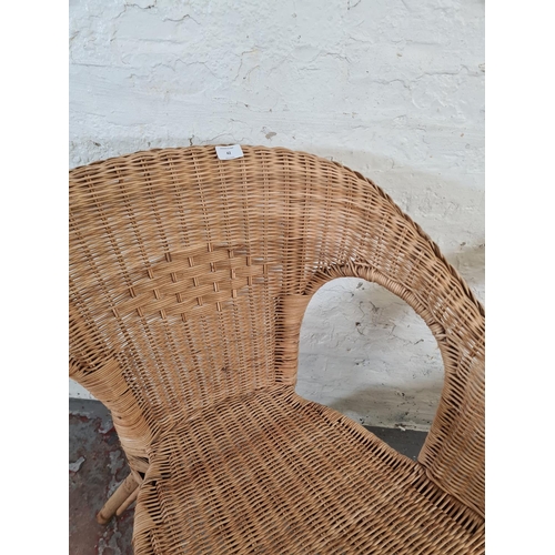 42 - A pair of modern wicker tub chairs