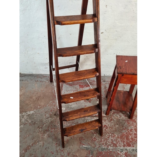 46 - Two pieces of pine furniture, one two tier plant stand - approx. 76cm high and one eight tread step ... 