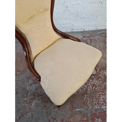 48 - A Victorian mahogany and fabric upholstered spoon back nursing chair