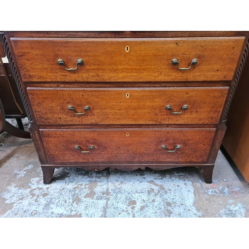 51 - A George III oak chest of two short over three long drawers - approx. 127cm high x 125cm wide x 55cm... 