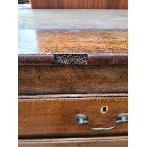 51 - A George III oak chest of two short over three long drawers - approx. 127cm high x 125cm wide x 55cm... 