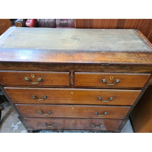 51 - A George III oak chest of two short over three long drawers - approx. 127cm high x 125cm wide x 55cm... 