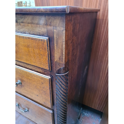 51 - A George III oak chest of two short over three long drawers - approx. 127cm high x 125cm wide x 55cm... 