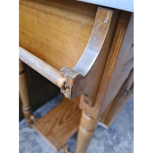 62 - An Edwardian satinwood washstand with marble top and ceramic tile splashback - approx. 128cm high x ... 