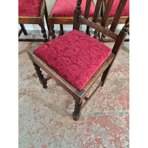 68 - Four mid 20th century oak barley twist dining chairs