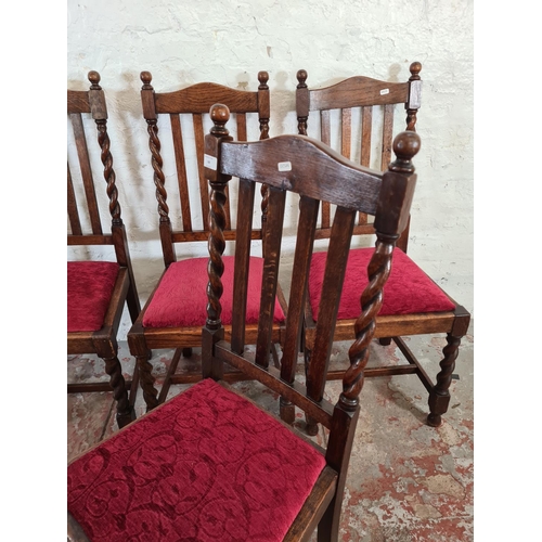 68 - Four mid 20th century oak barley twist dining chairs