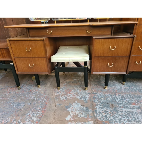 71 - Two pieces of G Plan tola wood and ebonised bedroom furniture, one dressing table with triple mirror... 