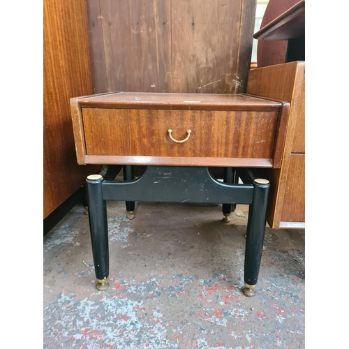 71 - Two pieces of G Plan tola wood and ebonised bedroom furniture, one dressing table with triple mirror... 