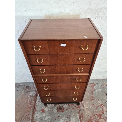 72 - A G Plan tola wood and ebonised chest of seven drawers - approx. 128cm high x 61cn wide x 41cm deep