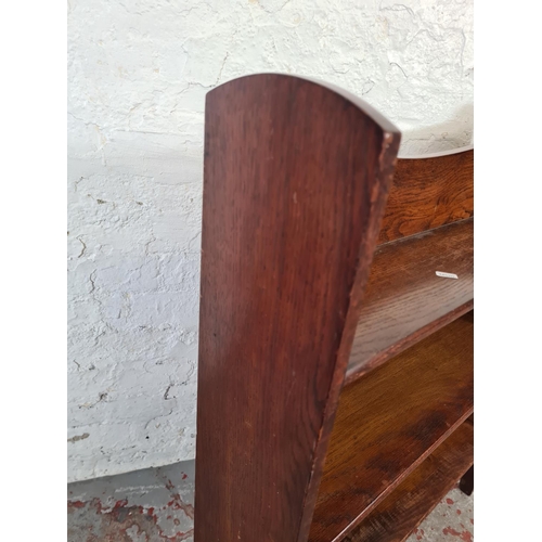 78 - A mid 20th century oak three tier bookcase - approx. 97cm high x 77cm wide x 18cm deep