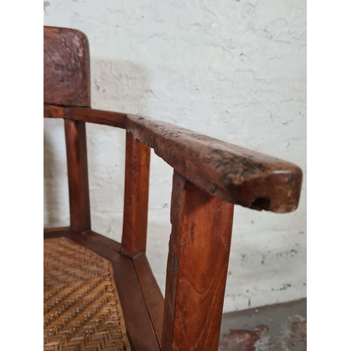 8 - A vintage elm and rattan office desk chair