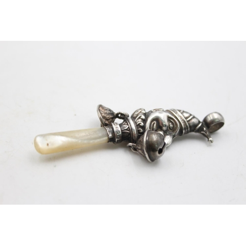 1253 - Two .925 silver baby rattles with mother of pearl handles - approx. gross weight 34 grams