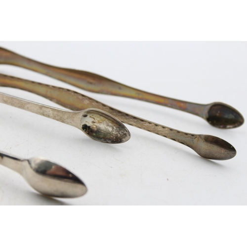 1263 - Two Georgian hallmarked silver sugar tongs - approx. gross weight 68 grams