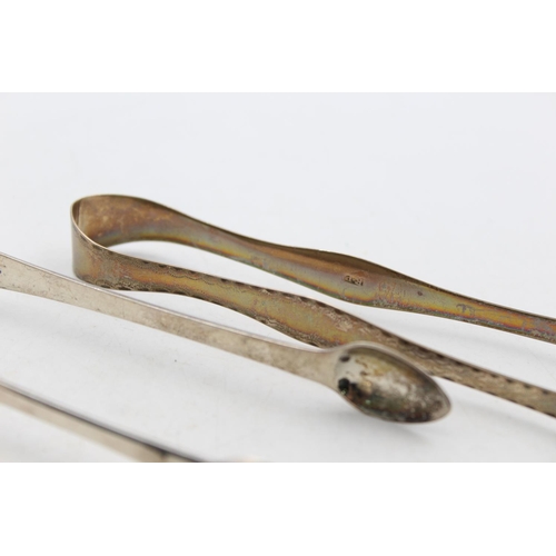 1263 - Two Georgian hallmarked silver sugar tongs - approx. gross weight 68 grams