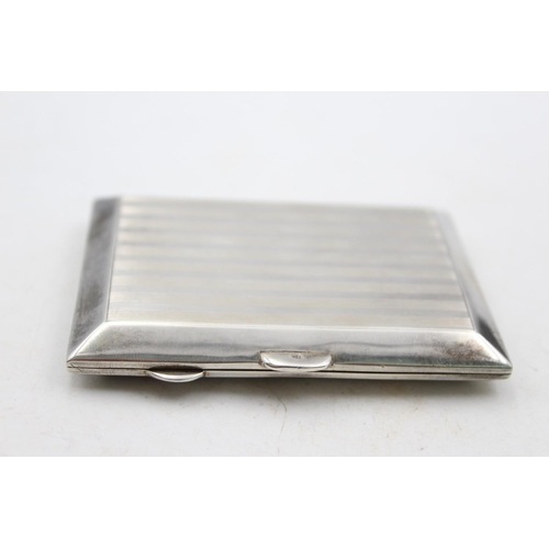 1264 - A George V W. J. Myatt & Co. Ltd. hallmarked Birmingham silver cigarette case, dated 1927 - approx. ... 