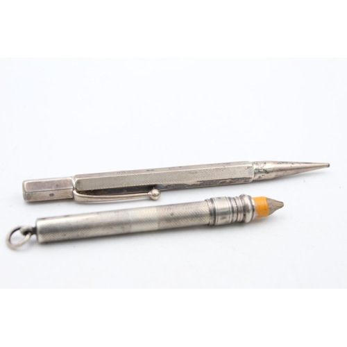 1279 - Two hallmarked silver propelling pencils - approx. gross weight 35 grams