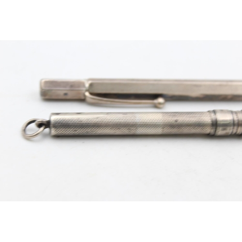 1279 - Two hallmarked silver propelling pencils - approx. gross weight 35 grams