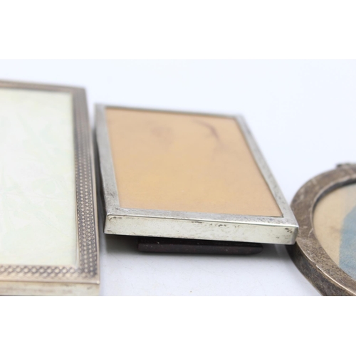 1284 - Three hallmarked silver photograph frames - approx. gross weight 249 grams