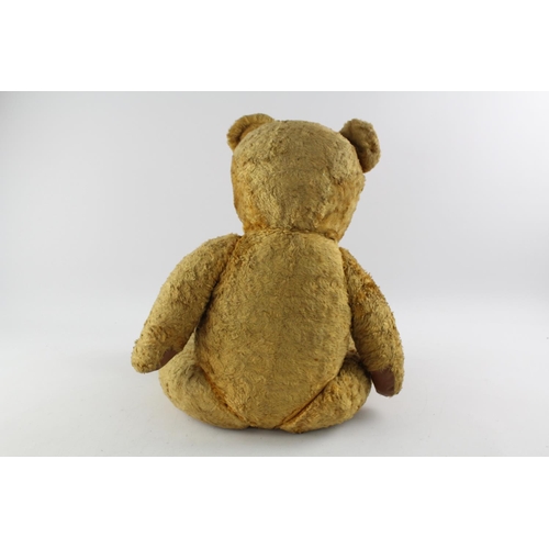 364 - A large vintage silk straw filled jointed teddy bear - approx. 75cm high