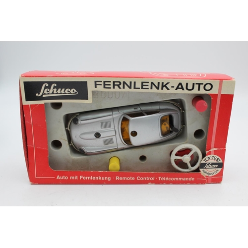 371 - A boxed vintage Schuco Jaguar E Type 3000/1 Fernlenk Auto remote control model vehicle