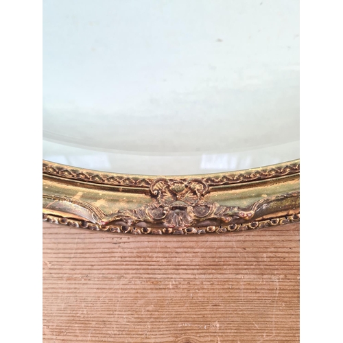 161 - A 19th century style gilt framed oval bevelled edge wall mirror - approx. 66cm high x 56cm wide