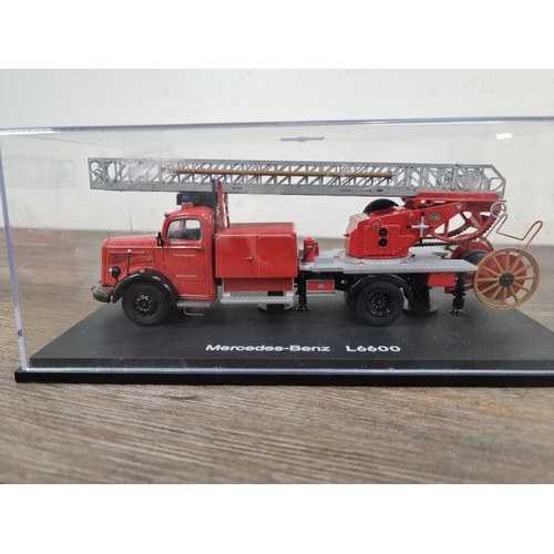 393 - A boxed Schuco Mercedes-Benz L6600 fire engine model vehicle