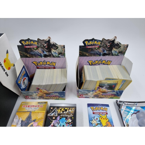 385 - A large collection of Pokémon trading cards