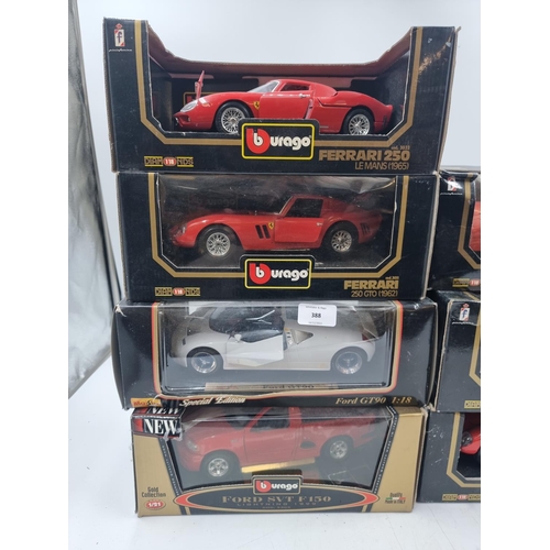 388 - Eight boxed model vehicles, six Burago, one Maisto and one Revell