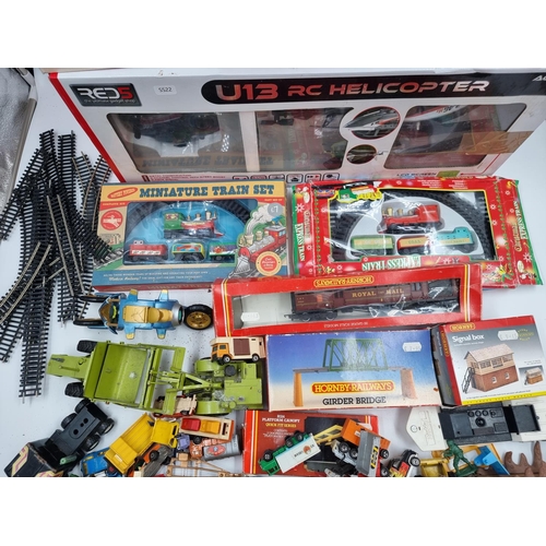 392 - A collection of assorted toys and games to include boxed Red 5 U13 radio controlled helicopter, Trac... 