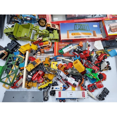 392 - A collection of assorted toys and games to include boxed Red 5 U13 radio controlled helicopter, Trac... 